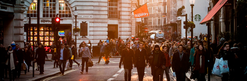 a group of people walking on a street